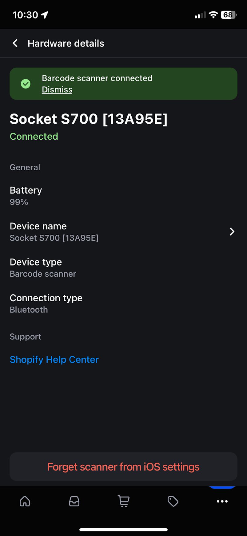Shopify POS Hardware details screen showing Socket S700 barcode scanner connected via Bluetooth with battery at 99 percent and a green connected status banner